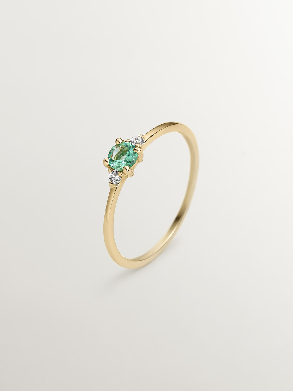 9K Yellow Gold Trilogy Ring with Emerald and Diamonds