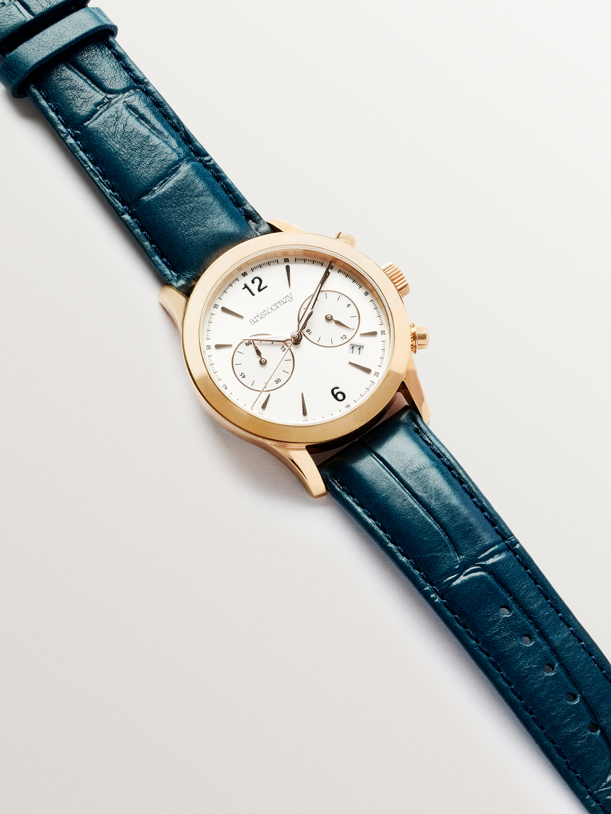 Montre Tribeca avec bracelet en cuir bleu et cadran blanc