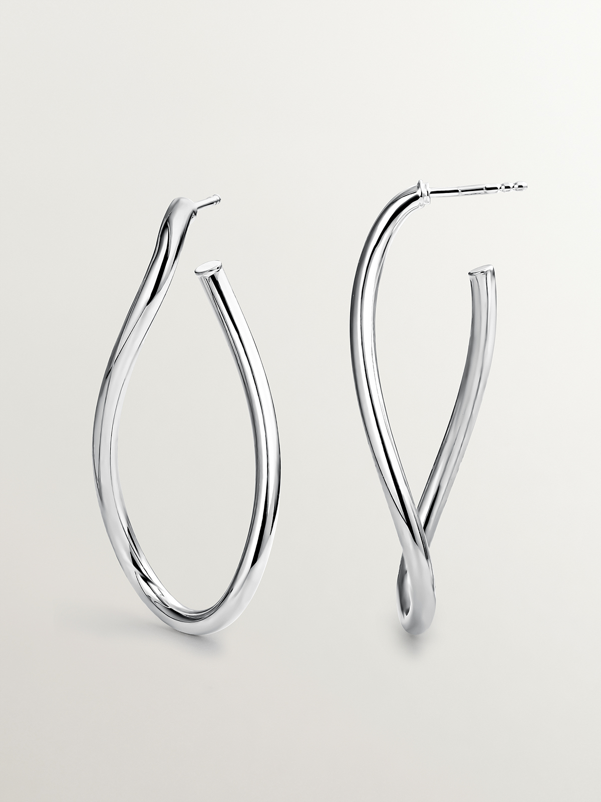 Boucles d'oreilles créoles ondulées grandes en argent 925.