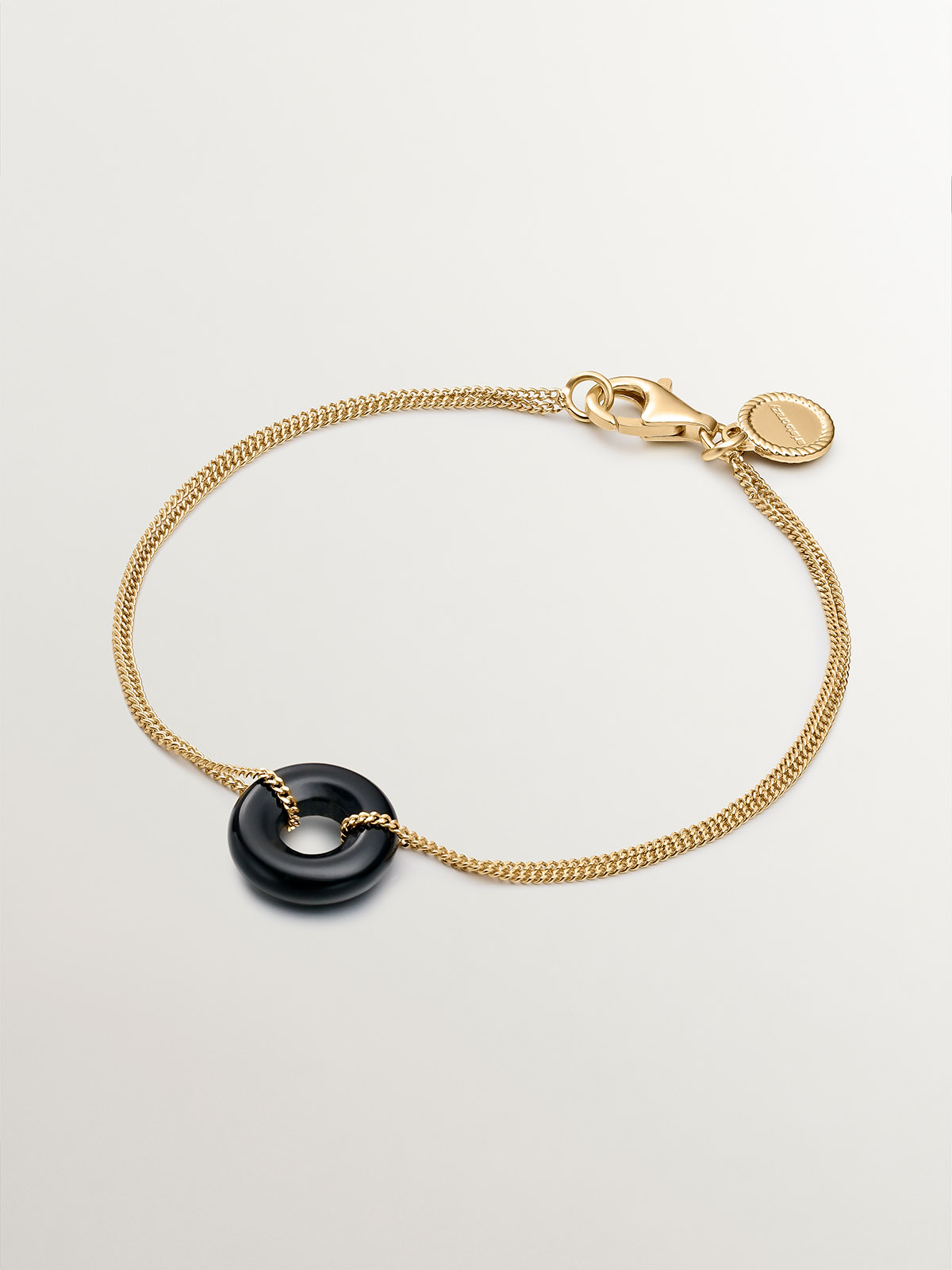 925 silver bracelet in 18k yellow gold with black ónix