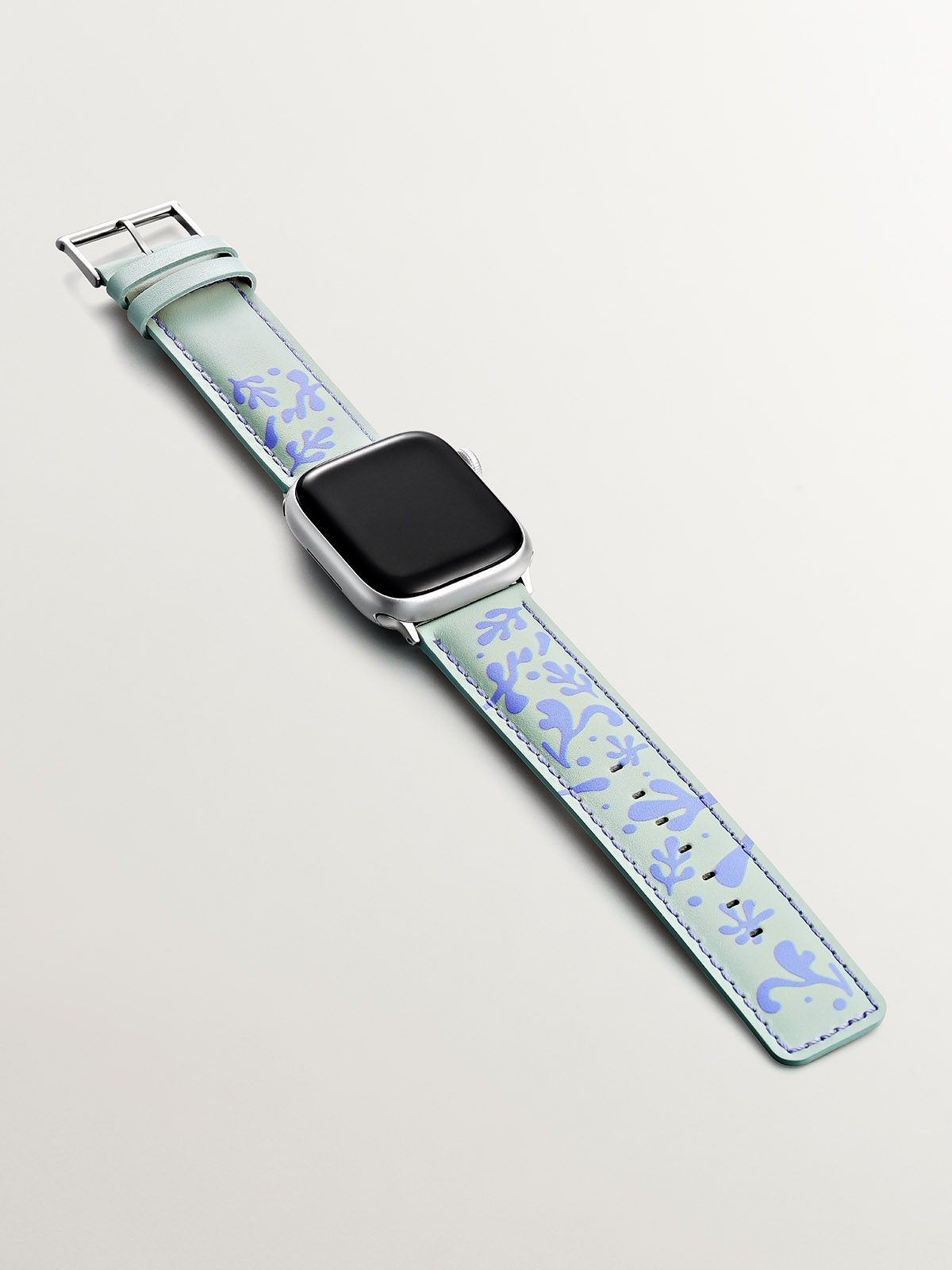 Correa para Apple Watch de cuero verde y lila con estampado floral