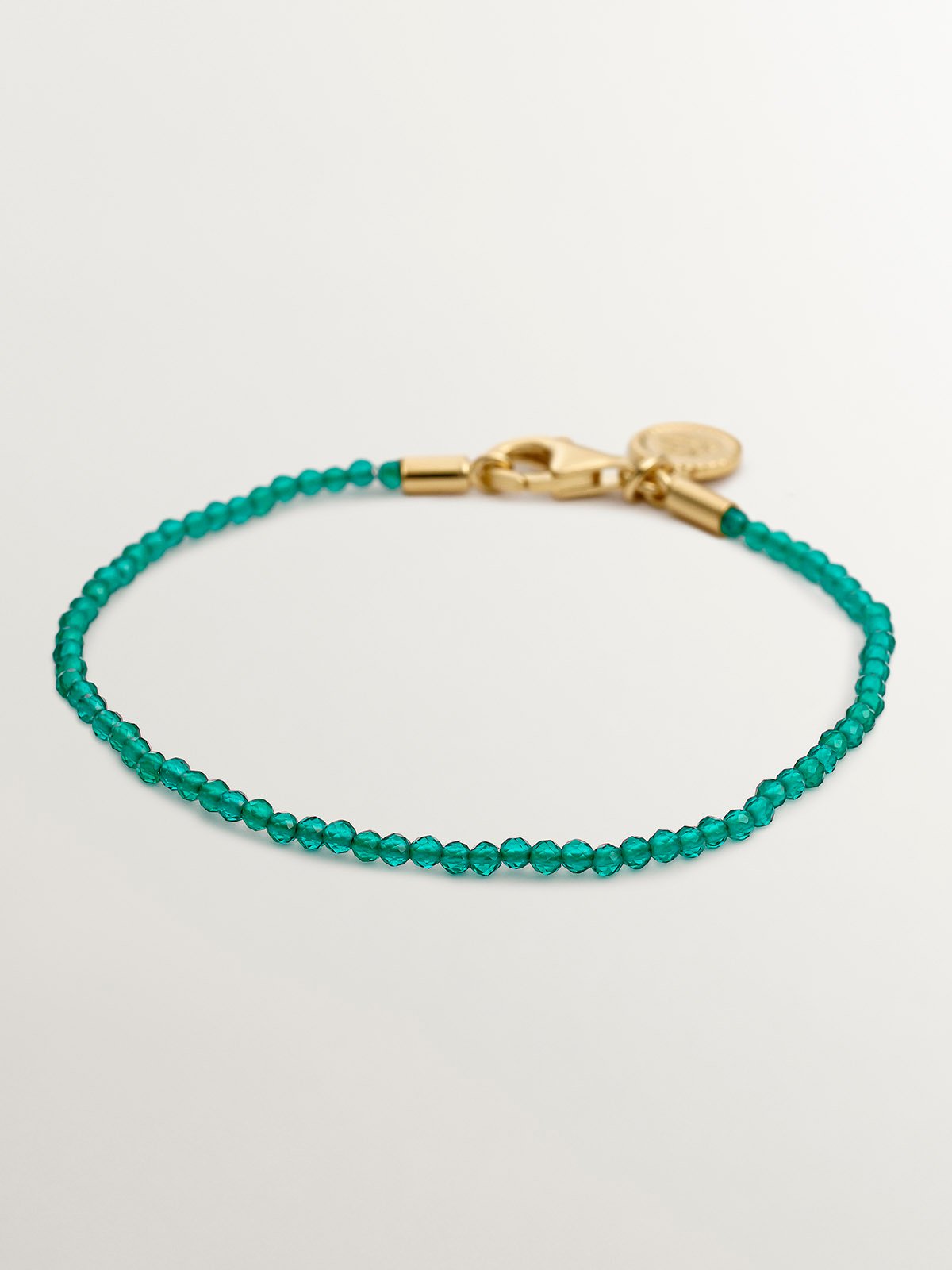 Pulsera de plata 925 bañada en oro amarillo de 18K con bolitas de ónix verde