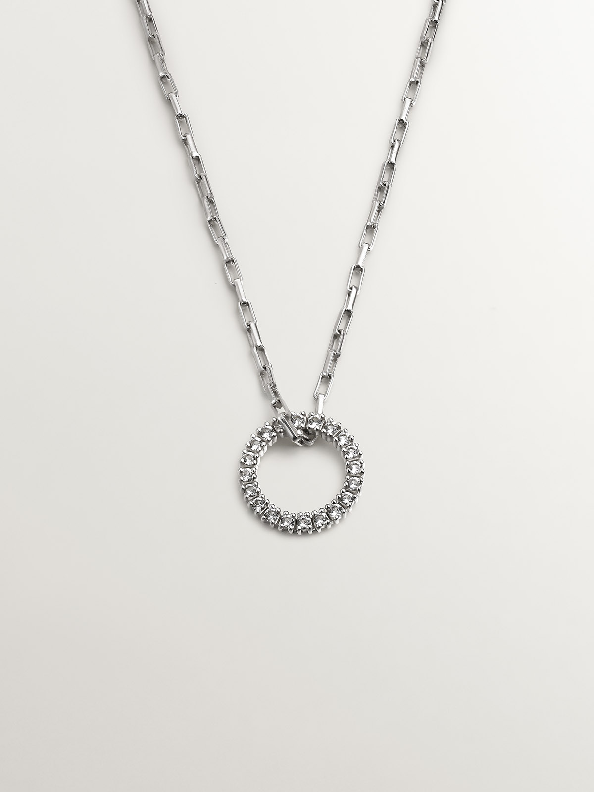 925 Silver pendant with circle of white topazes.
