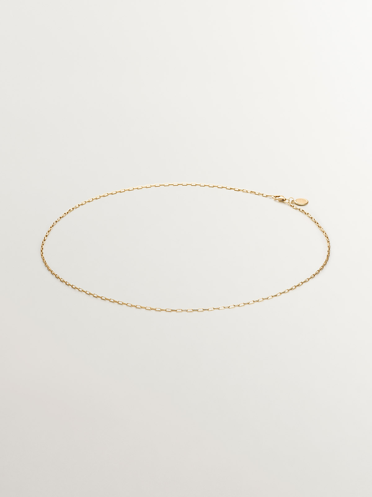 925 Silver chain bathed in 18K yellow gold with rectangular links.