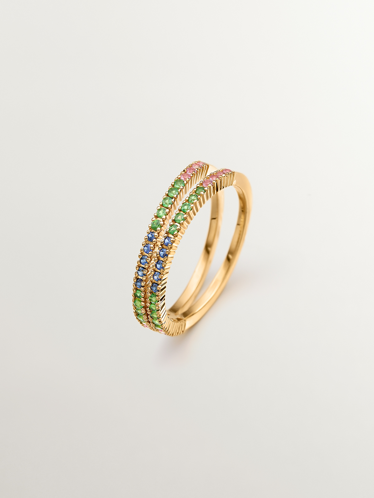 925 Silver Double Ring dipped in 18K yellow gold with tsavorites and multicolor sapphires.