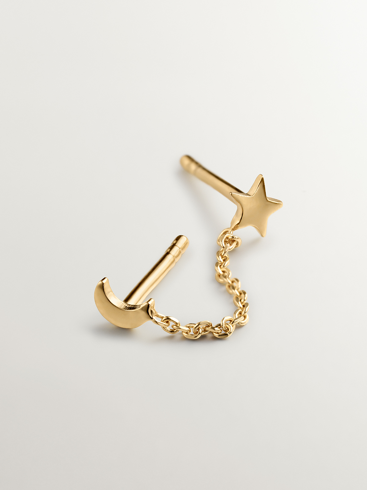 925 Silver Climber Earring plated in 18K yellow gold with moon and star.