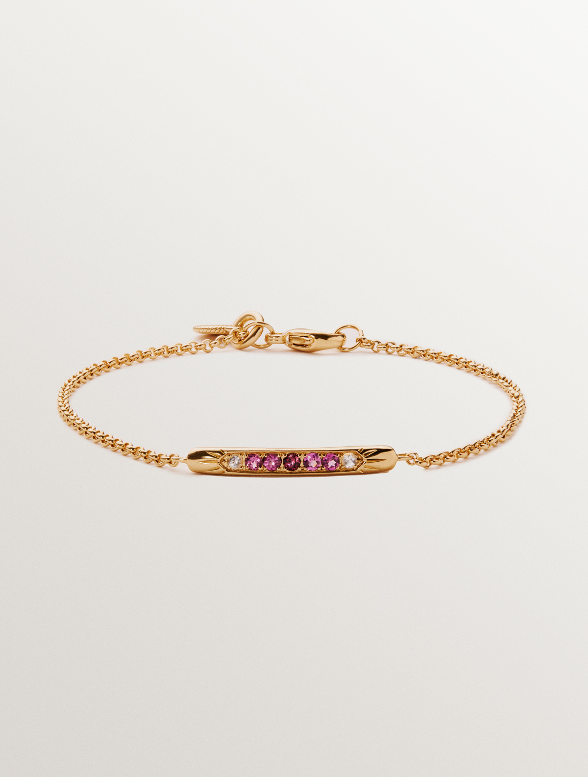 Pulsera de plata 925 bañada en oro amarillo de 18K con rodolitas moradas y topacios blancos