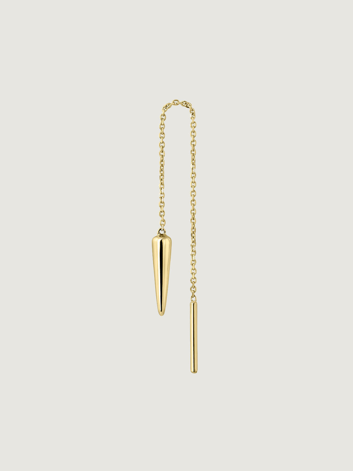 Individual 9K yellow gold earring with chain and spike.