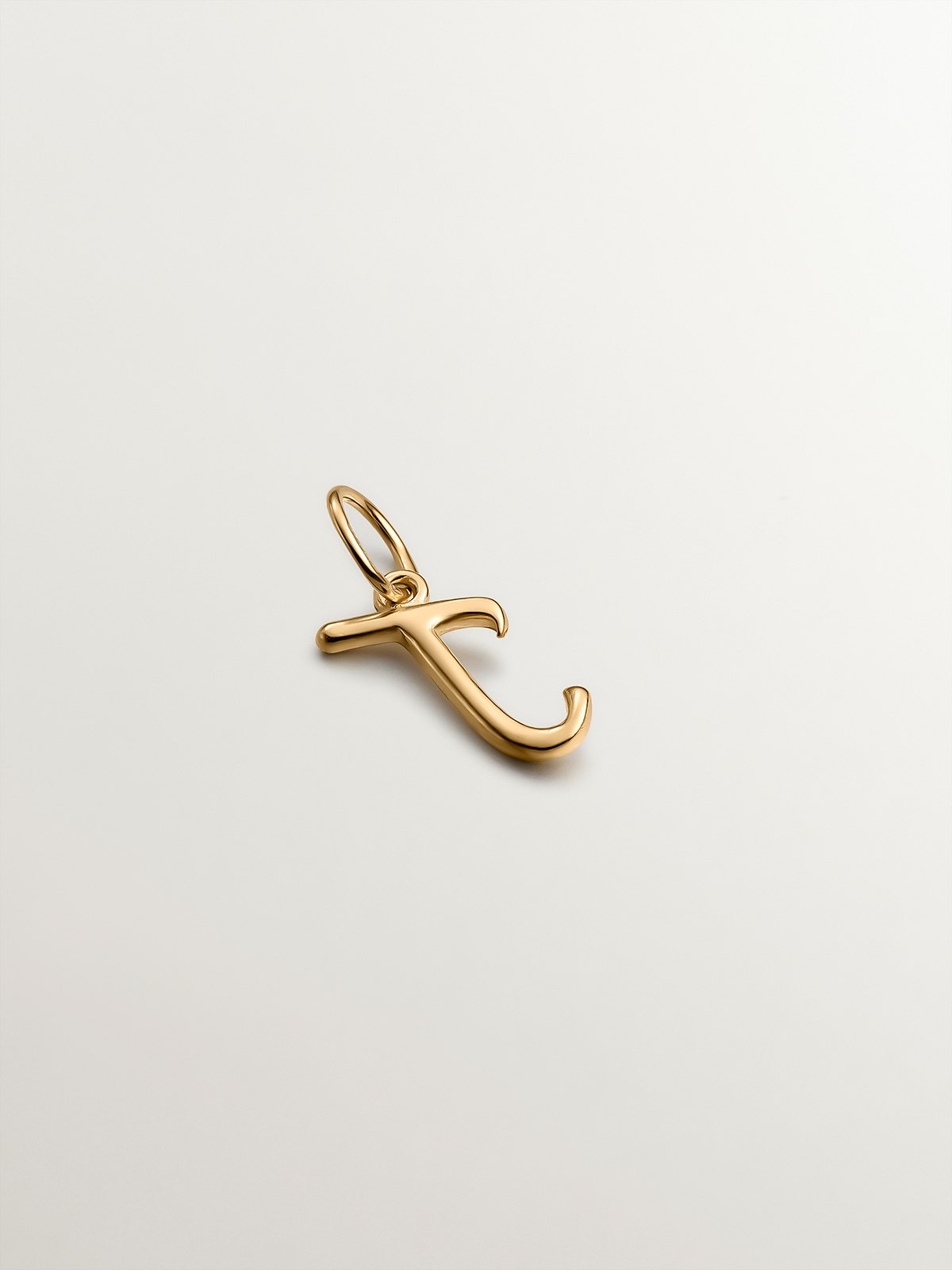 925 Silver charm bathed in 18K yellow gold with initial J.