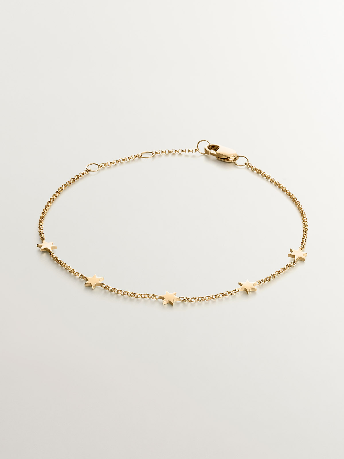 Bracelet en argent 925 plaqué or jaune 18K avec des étoiles