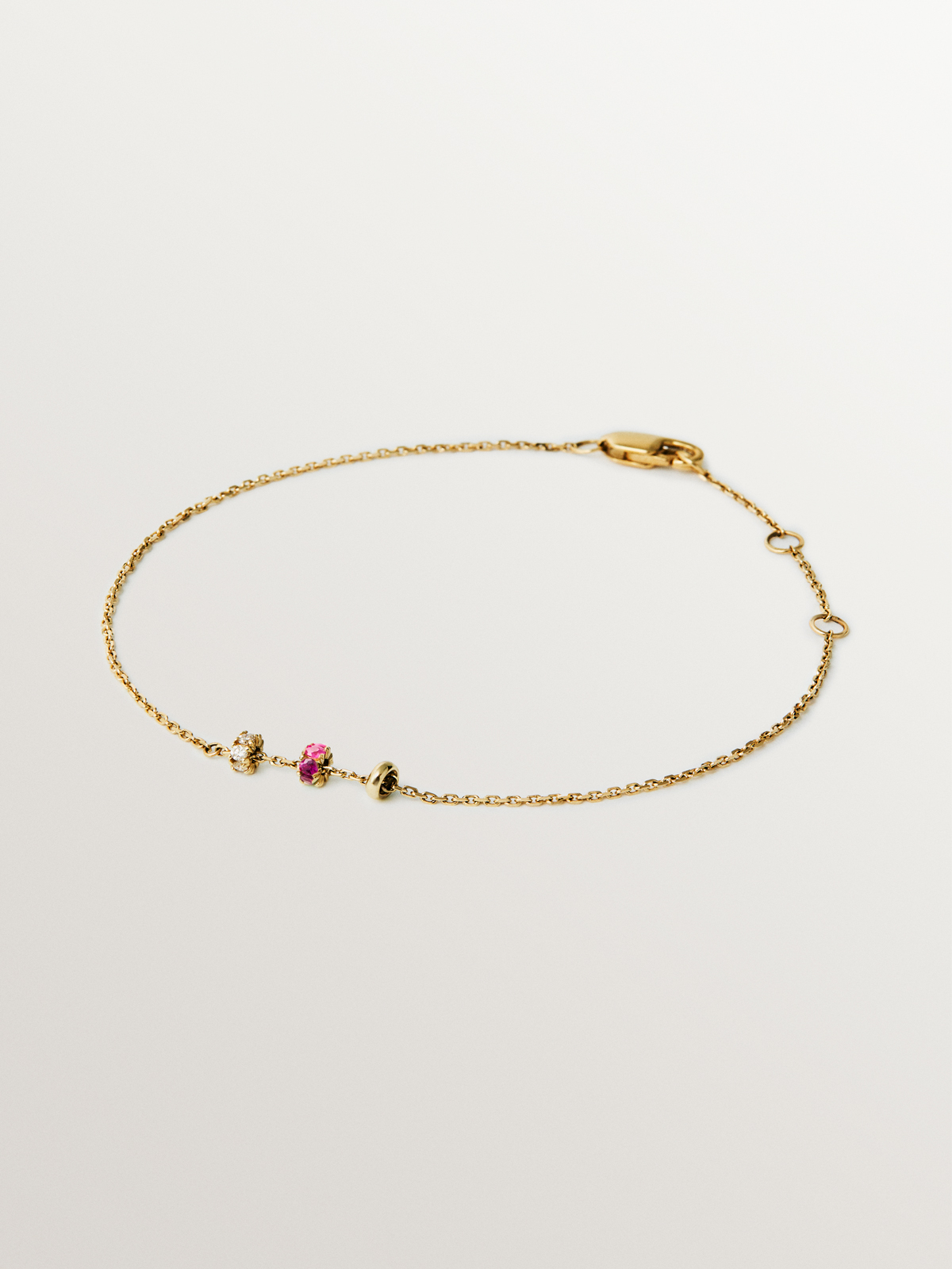 Pulsera de oro amarillo de 9K con rubís y diamantes