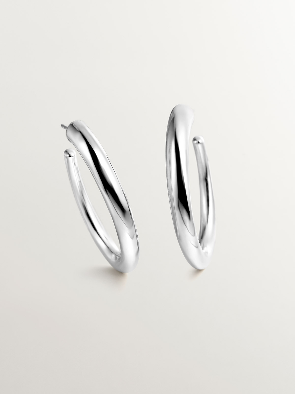 Large 925 silver hoop earrings with an oval shape