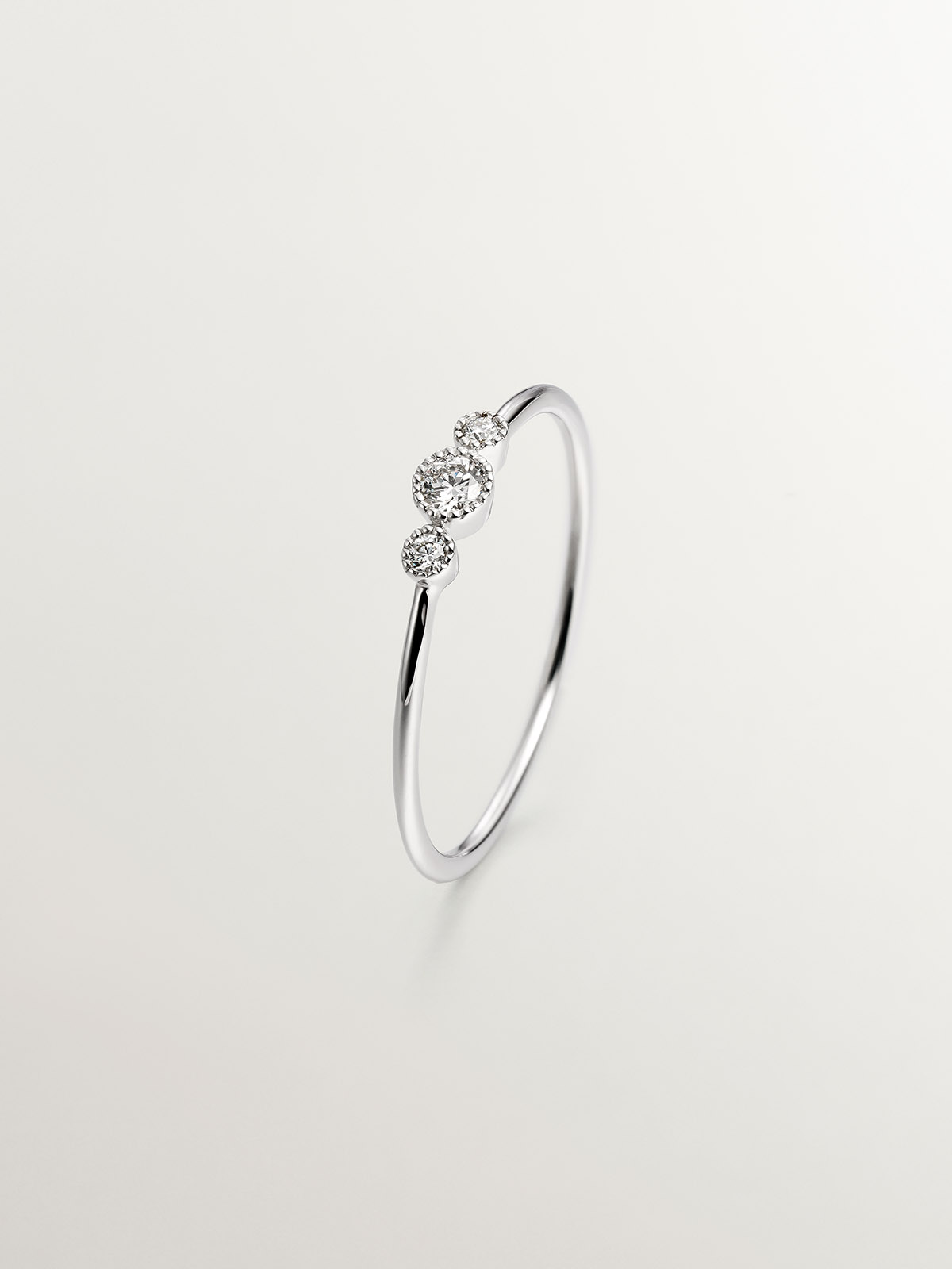 Bague triplet en or blanc 18 carats avec diamants 0,0187 cts