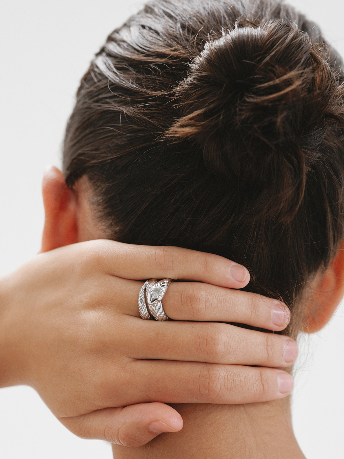 925 Silver wide ring shaped as a snake with topaz and white sapphires.