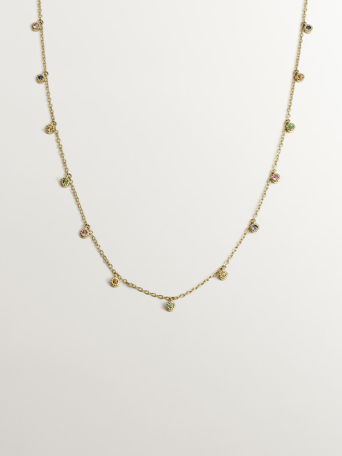 Collier en or jaune 9K avec tsavorites et saphirs multicolores