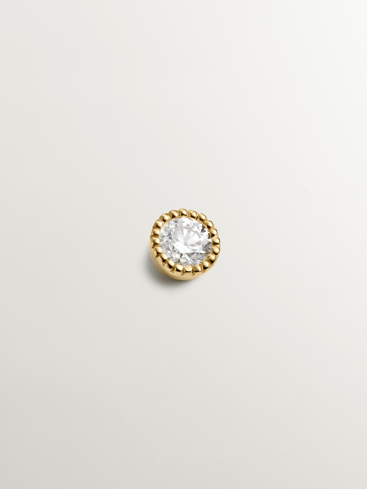 Piercing de oro amarillo de 18K con diamante 0,048 cts