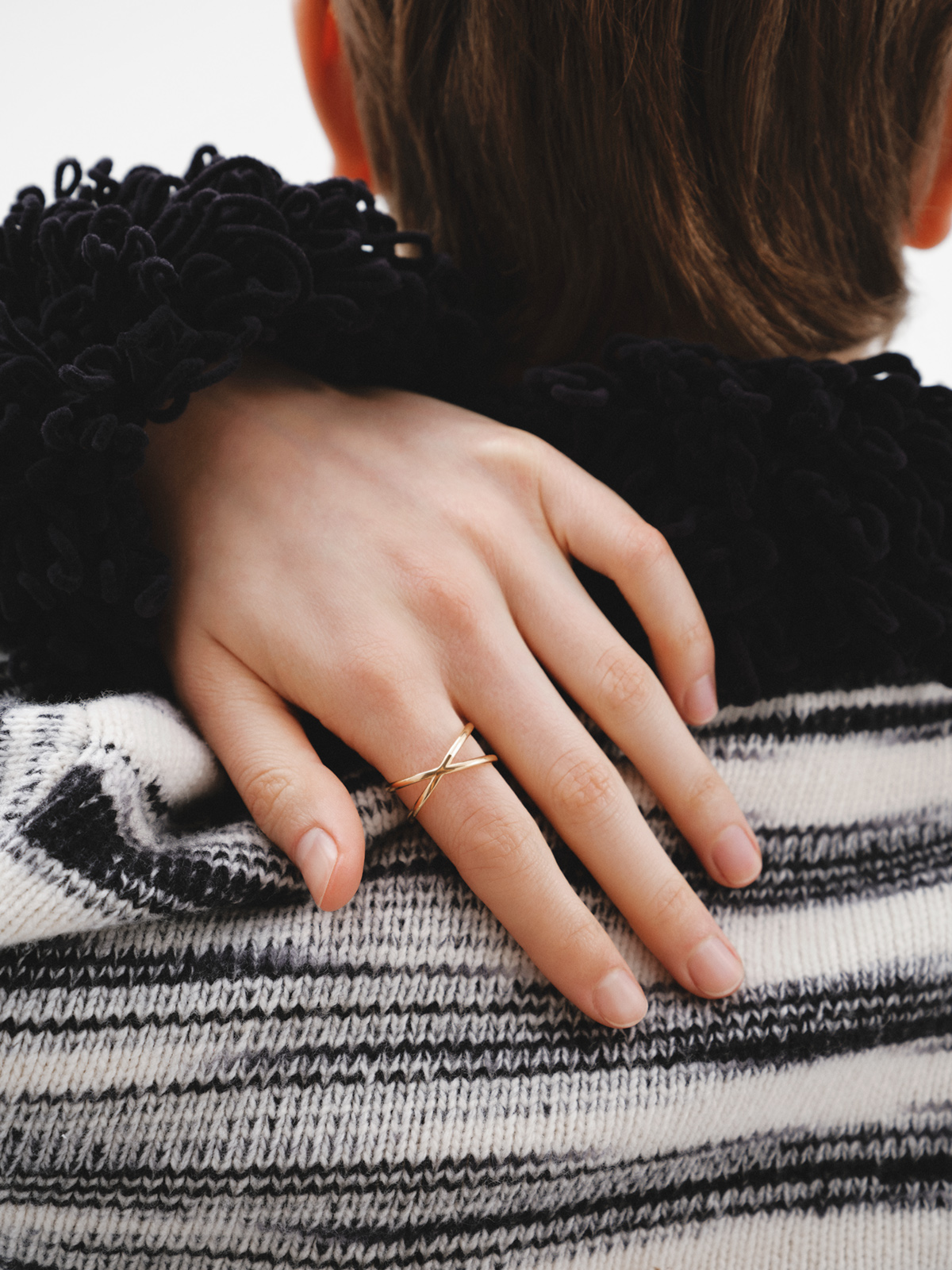 Double Crossed Ring made of 925 Silver coated in 18K Yellow Gold.