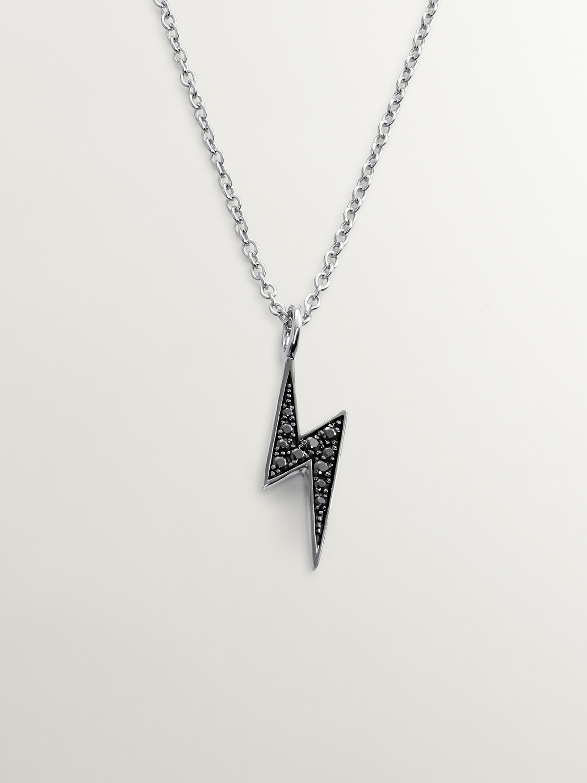 925 Silver pendant with lightning bolt and black spinels
